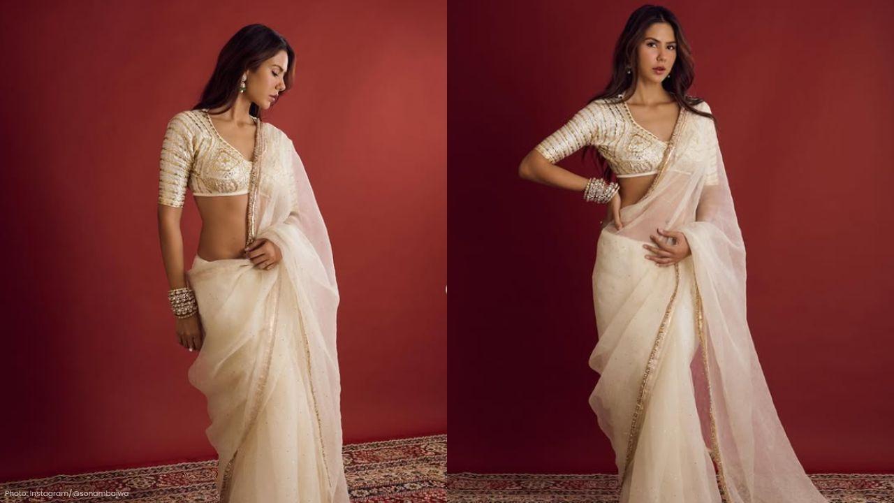Sonam Bajwa Dazzles in Stylish Off-White Saree Ensemble Sonam Bajwa Dazzles in Stylish Off-White Saree Ensemble