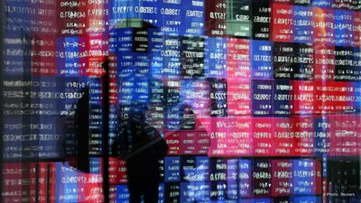 Asian Markets Rally as Japan Hikes Interest Rates Amid Wall Street Gains