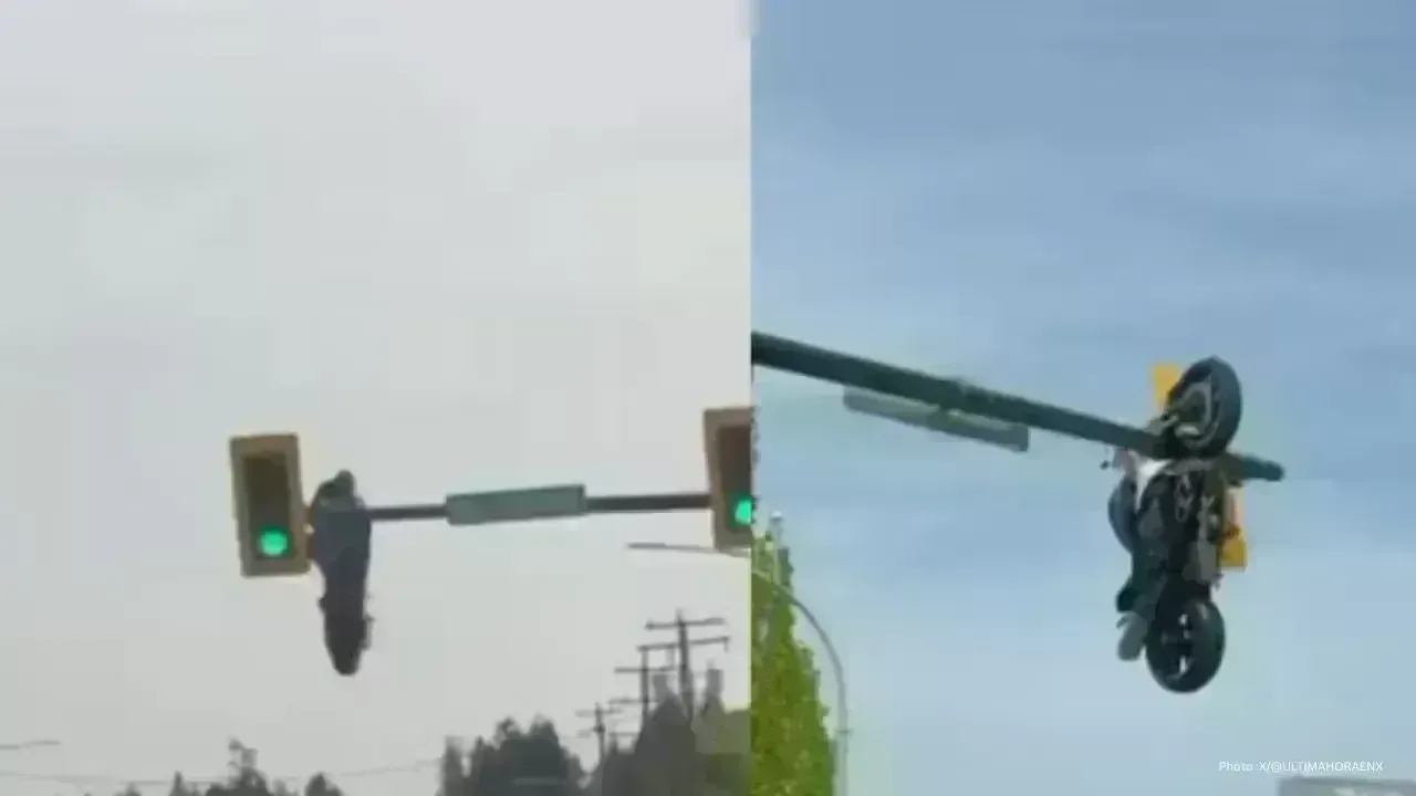 Motorcycle Suspended from Traffic Signal Following Collision in Canada