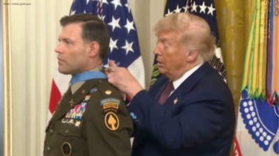 Trump Struggles to Fasten Medal of Honor During White House Event